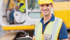 Construction worker with clipboard