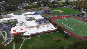 school with track and football field